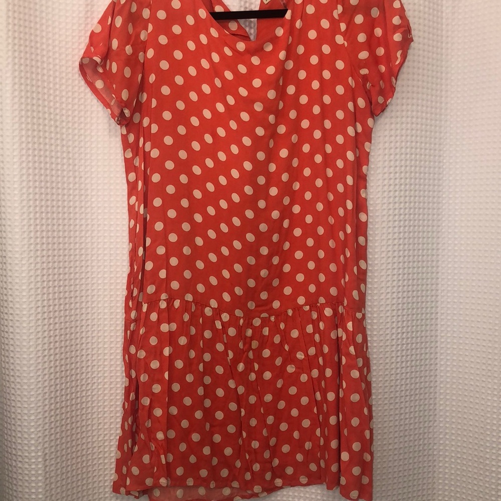 Orange and white polka dotted dress